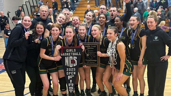 San Ramon Valley girls celebrate after a truly shocking 76-43 North Coast Section Open Division title victory over top seed Acalanes at Campolindo High School.