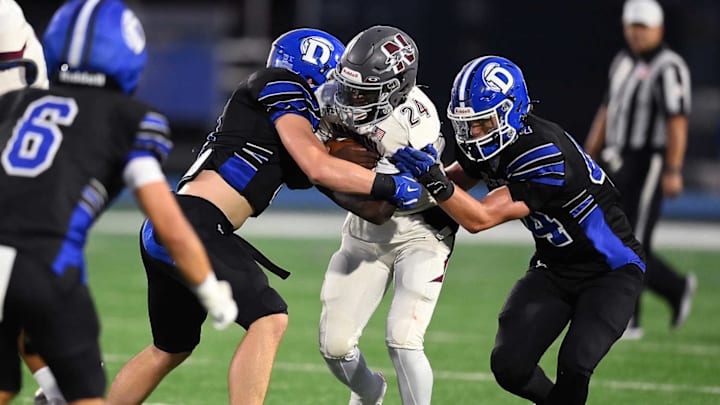 Naugatuck fell to Holy Cross on Friday night with a final score of 28-34.