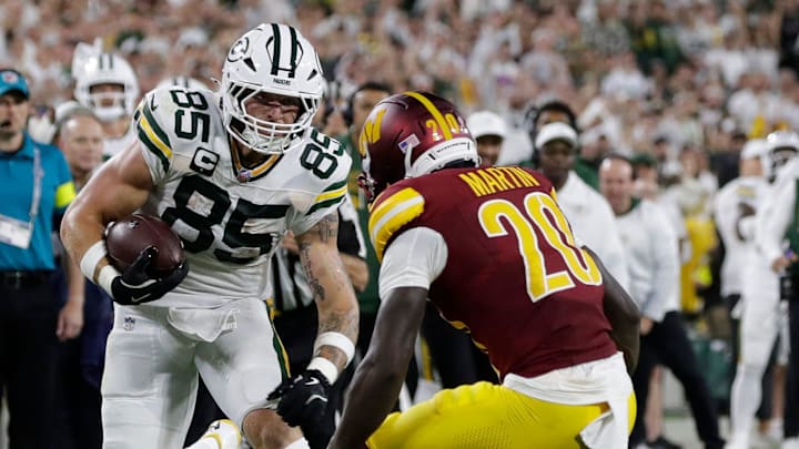 Green Bay Packers tight end Tucker Kraft (85) carries the ball during a game against the Washington Commanders on Sept. 11, 2025, at Lambeau Field in Green Bay, Wis. The Packers defeated the Commanders 27-18.