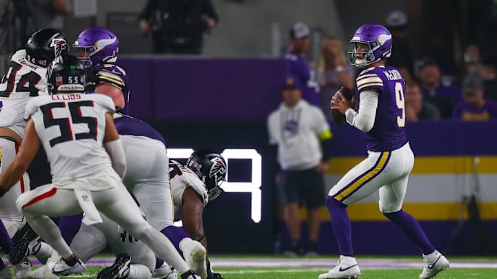 Minnesota Vikings quarterback J.J. McCarthy drops back to pass against the Atlanta Falcons in Week 2 of the 2025 NFL season. 