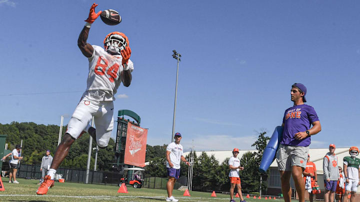 Aug 7, 2024; Clemson, South Carolina, USA; Clemson tight end Markus Dixon (84) catches a pass during Clemson football practice at Jervey Meadows in Clemson, S.C. Mandatory Credit: Ken Ruinard-Imagn Images