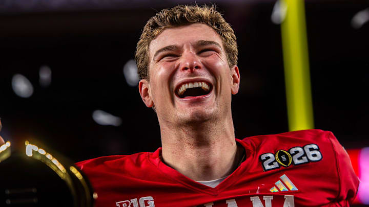 Indiana's Fernando Mendoza (15) smiles on the podium after the College Football Playoff National Championship college football game at Hard Rock Stadium in Miami Gardens on Monday, Jan. 19, 2026. Indiana's Fernando Mendoza (15) smiles on the podium after the College Football Playoff National Championship college football game at Hard Rock Stadium in Miami Gardens on Monday, Jan. 19, 2026.