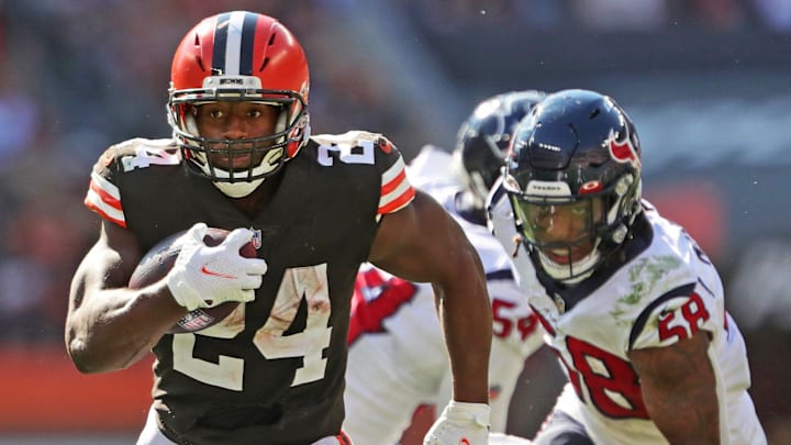 Cleveland Browns running back Nick Chubb (24) rushes for a touchdown ahead of Houston Texans outside linebacker Christian Kirksey (58) during the second half of an NFL football game, Sunday, Sept. 19, 2021, in Cleveland, Ohio. [Jeff Lange/Beacon Journal]

Browns 18