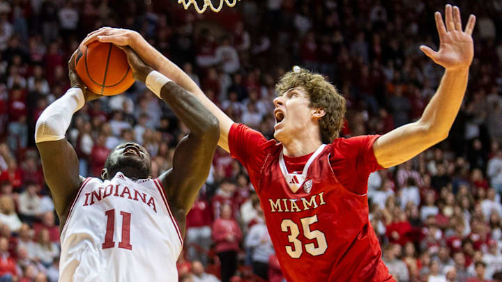 Indiana's Oumar Ballo (11) is fouled by Miami's Reece Potter (35) during the Indiana versus Miami (Ohio) men's basketball game at Simon Skjodt Asseembly Hall on Friday, Dec. 6, 2024. Indiana's Oumar Ballo (11) is fouled by Miami's Reece Potter (35) during the Indiana versus Miami (Ohio) men's basketball game at Simon Skjodt Asseembly Hall on Friday, Dec. 6, 2024.