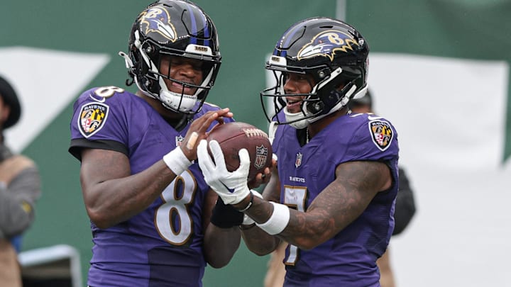 Sep 11, 2022; East Rutherford, New Jersey, USA; Baltimore Ravens quarterback Lamar Jackson (8) celebrates with wide receiver Rashod Bateman (7) during the second half against the New York Jets at MetLife Stadium. Mandatory Credit: Vincent Carchietta-Imagn Images Sep 11, 2022; East Rutherford, New Jersey, USA; Baltimore Ravens quarterback Lamar Jackson (8) celebrates with wide receiver Rashod Bateman (7) during the second half against the New York Jets at MetLife Stadium. Mandatory Credit: Vincent Carchietta-Imagn Images