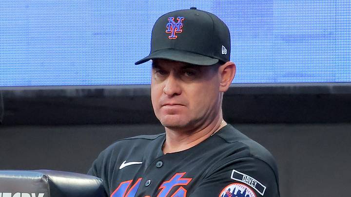 Jun 25, 2026; New York City, New York, USA; New York Mets manager Carlos Mendoza (64) watches from the dugout during the third inning against the Chicago Cubs at Citi Field. Mandatory Credit: Brad Penner-Imagn Images
