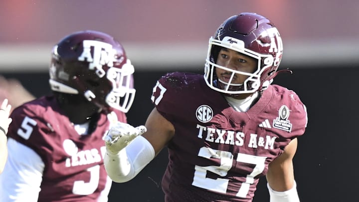 Dec 20, 2025; College Station, TX, USA; Texas A&M Aggies linebacker Daymion Sanford (27) reacts after recovering  a fumble against the Miami Hurricanes during the second half of the first round game of the CFP National Playoff at Kyle Field. Mandatory Credit: Maria Lysaker-Imagn Images