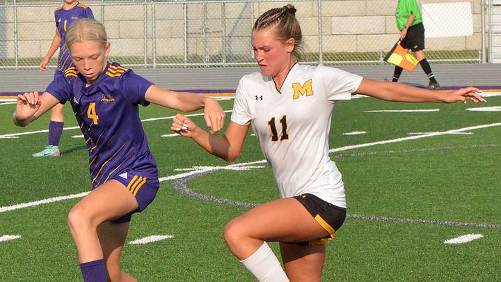 Mitchell's Emilie Ellis (right). Mitchell's Emilie Ellis (right).