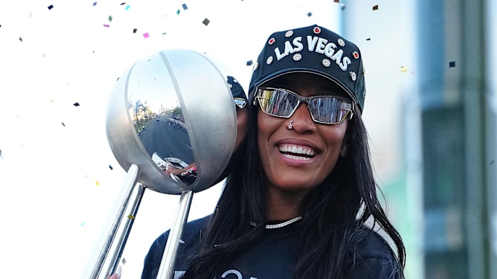 Oct 17, 2025; Las Vegas, NV, USA; Las Vegas Aces center A'Ja Wilson (22) celebrates during the 2025 WNBA Championship parade at Toshiba Plaza. Mandatory Credit: Stephen R. Sylvanie-Imagn Images