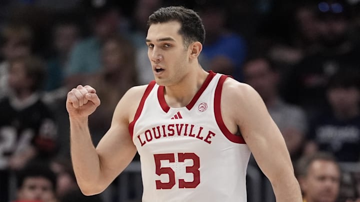 Mar 11, 2026; Charlotte, NC, USA; Louisville Cardinals forward Vangelis Zougris (53) reacts to a score during the second half against the Southern Methodist University Mustangs at Spectrum Center. Mandatory Credit: Jim Dedmon-Imagn Images Mar 11, 2026; Charlotte, NC, USA; Louisville Cardinals forward Vangelis Zougris (53) reacts to a score during the second half against the Southern Methodist University Mustangs at Spectrum Center. Mandatory Credit: Jim Dedmon-Imagn Images