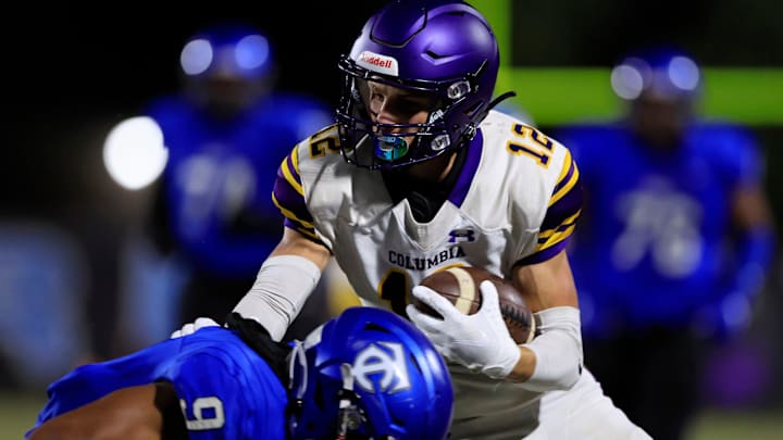 Columbia's Camdon Frier (12) maneuvers past Trinity Christian Academy's Kyle Boylston (9) during the first quarter of a regular season football game Friday, Sept. 23, 2022 at Trinity Christian Academy in Jacksonville.

Prep Football Gridiron Football High School Football Fhsaa Trinity Christian Academy Columbia High School Tigers Conquerers Lake City Jacksonville Sports