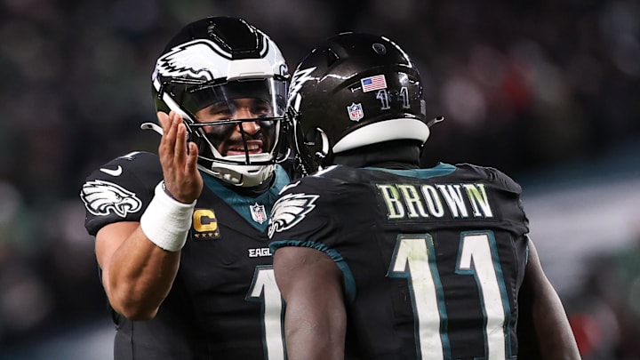 Nov 28, 2025; Philadelphia, Pennsylvania, USA; Philadelphia Eagles quarterback Jalen Hurts (1) and wide receiver A.J. Brown (11) celebrate a touchdown against the Chicago Bears during the third quarter of the game at Lincoln Financial Field. Mandatory Credit: Bill Streicher-Imagn Images
