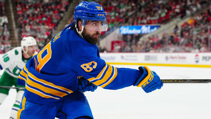 Feb 27, 2025; Raleigh, North Carolina, USA;  Buffalo Sabres right wing Alex Tuch (89) takes shot against the Carolina Hurricanes during the second period at Lenovo Center. Mandatory Credit: James Guillory-Imagn Images