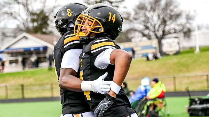 Detroit King's Don Spillers, right, celebrate his touchdown catch with Tay'Shawn Henry during the fourth quarter in the game against Mason on Saturday, Nov. 23, 2024, at Chelsea High School.