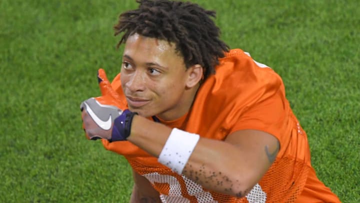 Clemson corner back Avieon Terrell (20) stretches during preseason practice at the Poe Indoor Practice Facility at the Allen N. Reeves football complex in Clemson, S.C. Monday, August 7, 2023.