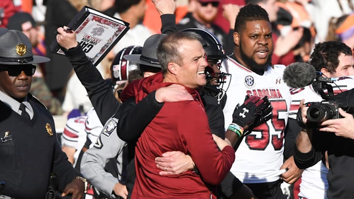 Nov 30, 2024; Clemson, South Carolina, USA; Clemson head coach Dabo Swinney and South Carolina Head Coach Shane Beamer talk after the game at Memorial Stadium. Mandatory Credit: Ken Ruinard-Imagn Images