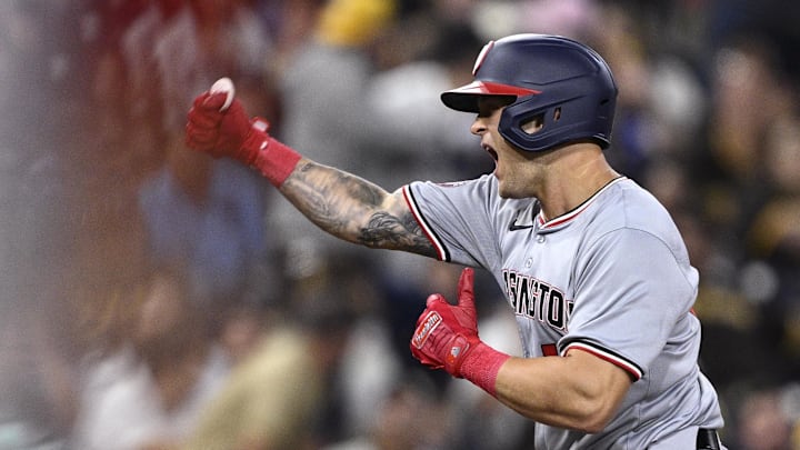 Washington Nationals third baseman Nick Senzel (13) celebrates after hitting a two-run home run against the San Diego Padres during the tenth inning at Petco Park. 