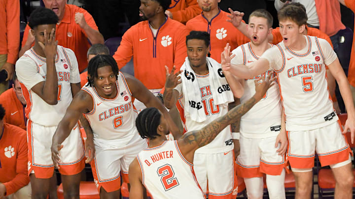 Feb 8, 2025; Clemson, South Carolina, USA; Clemson Tigers guard Dillon Hunter (2) reacts with teammates after making a three point shot against Duke Blue Devils during the second half at Littlejohn Coliseum. 