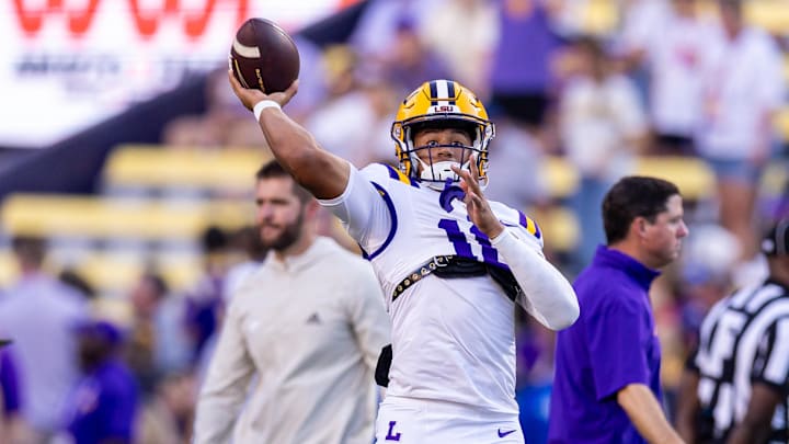 Sep 28, 2024; Baton Rouge, Louisiana, USA;  LSU Tigers quarterback Colin Hurley (16) during warmups before a game against the South Alabama Jaguars at Tiger Stadium. Mandatory Credit: Stephen Lew-Imagn Images