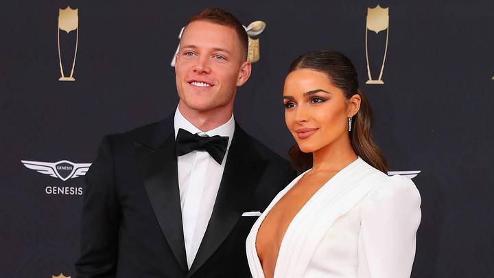 Christian McCaffrey and Olivia Culpo on the Red Carpet poses prior to the NFL, American Football Herren, USA Honors on February 1, 2020.