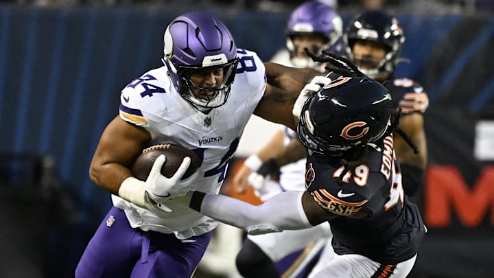 Vikings tight end Josh Oliver catches the ball against Bears linebacker Tremaine Edmunds in the season opener.