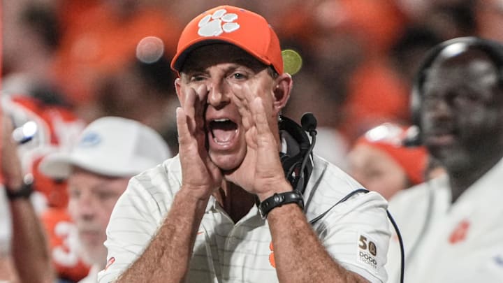Clemson head coach Dabo Swinney communicates with a referee in the game with Louisiana State University during the second quarter at Memorial Stadium in Clemson, S.C. Saturday, Aug 30, 2025.