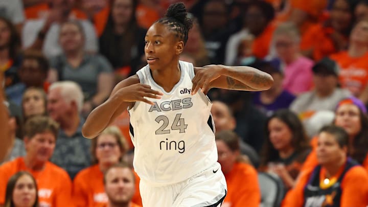 Oct 8, 2025; Phoenix, Arizona, USA; Las Vegas Aces guard Jewell Loyd (24) reacts after a three point basket against the Phoenix Mercury in the first half during game three of the 2025 WNBA Finals at PHX Arena. Mandatory Credit: Mark J. Rebilas-Imagn Images
