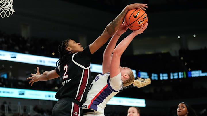 Dec 8, 2024; Fort Worth, Texas, USA;  TCU Horned Frogs guard Hailey Van Lith (10) has her shot blocked by South Carolina Gamecocks forward Ashlyn Watkins (2) during the second half at Dickies Arena. Mandatory Credit: Chris Jones-Imagn Images