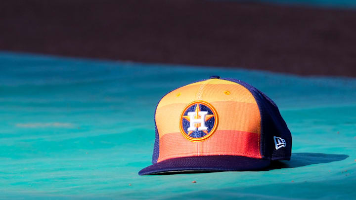 Apr 9, 2024; Kansas City, Missouri, USA; A general view of Houston Astros second base Jose Altuve (27) hat on the field during batting practice prior to a game against the Kansas City Royals at Kauffman Stadium. Mandatory Credit: Denny Medley-Imagn Images
