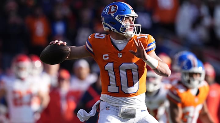 Jan 5, 2025; Denver, Colorado, USA; Denver Broncos quarterback Bo Nix (10) throws a pass in the first quarter against the Kansas City Chiefs at Empower Field at Mile High.