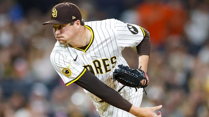 Aug 18, 2025; San Diego, California, USA; San Diego Padres relief pitcher Mason Miller (22) throws a pitch during the ninth inning against the San Francisco Giants at Petco Park. Mandatory Credit: David Frerker-Imagn Images