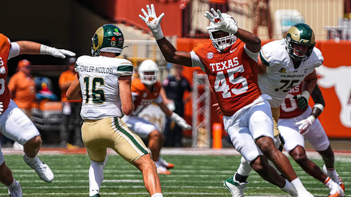 Texas Longhorns defensive lineman Vernon Broughton (45) pressures Colorado State quarterback Brayden Fowler-Nicolosi (16) during the game at Darrell K Royal-Texas Memorial Stadium in Austin Saturday, Aug. 31, 2024. Texas Longhorns defensive lineman Vernon Broughton (45) pressures Colorado State quarterback Brayden Fowler-Nicolosi (16) during the game at Darrell K Royal-Texas Memorial Stadium in Austin Saturday, Aug. 31, 2024.