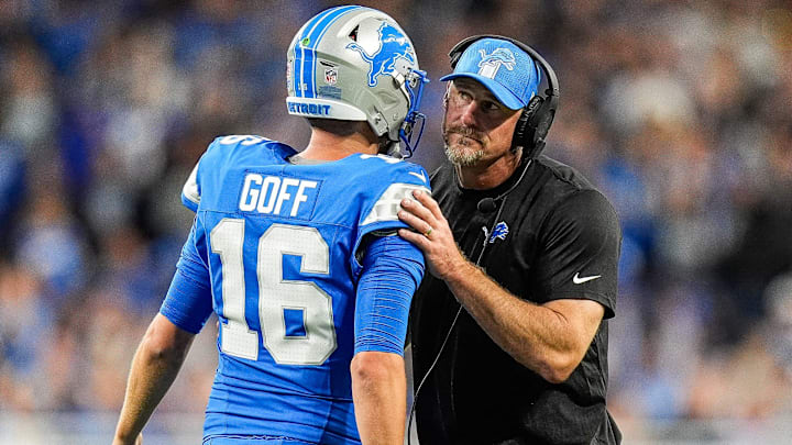 Detroit Lions quarterback Jared Goff (16) talks to head coach Dan Campbell at a timeout against Los Angeles Rams 