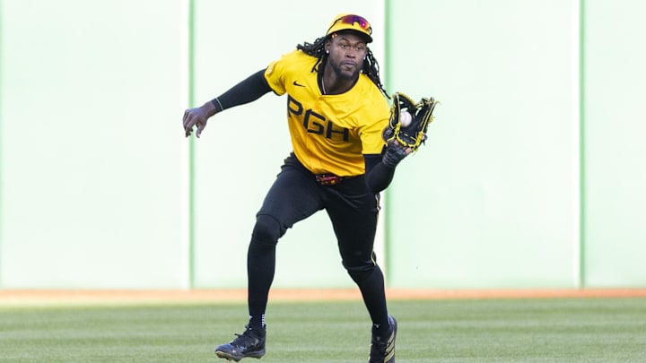 May 9, 2025; Pittsburgh, Pennsylvania, USA; Pittsburgh Pirates center fielder Oneil Cruz (15) catches a fly ball for the third out in the second inning against the Atlanta Braves at PNC Park. Mandatory Credit: Scott Galvin-Imagn Images
