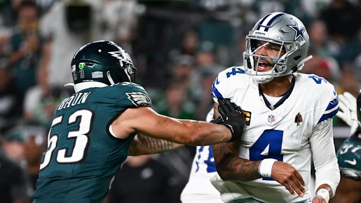 Philadelphia Eagles linebacker Zack Baun hits Dallas Cowboys quarterback Dak Prescott after a pass at Lincoln Financial Field. 