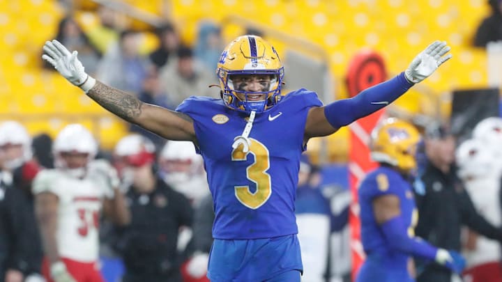 Oct 14, 2023; Pittsburgh, Pennsylvania, USA;  Pittsburgh Panthers defensive back Donovan McMillon (3) reacts after a defensive stop against the Louisville Cardinals during the fourth quarter at Acrisure Stadium. Mandatory Credit: Charles LeClaire-Imagn Images