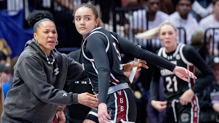 South Carolina basketball coach Dawn Staley with guard Tessa Johnson and forward Chloe Kitts