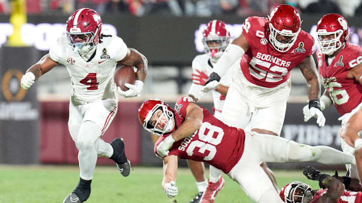 Alabama's Daniel Hill (4) gets by OklahomaÕs Owen Heinecke (38) in the second half of the College Football Playoff game between the University of Oklahoma Sooners (OU) and the Alabama Crimson Tide at the Gaylord Family - Oklahoma Memorial Stadium in Norman, Okla., Friday Dec. 19, 2025.