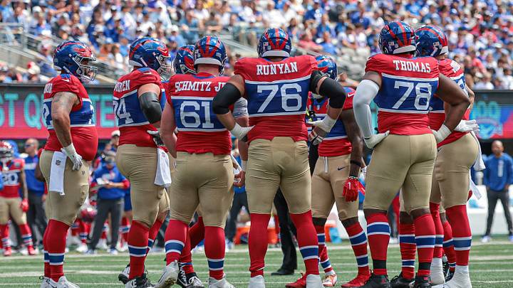 Sep 8, 2024; East Rutherford, New Jersey, USA; New York Giants offensive linemen huddle. Sep 8, 2024; East Rutherford, New Jersey, USA; New York Giants offensive linemen huddle.