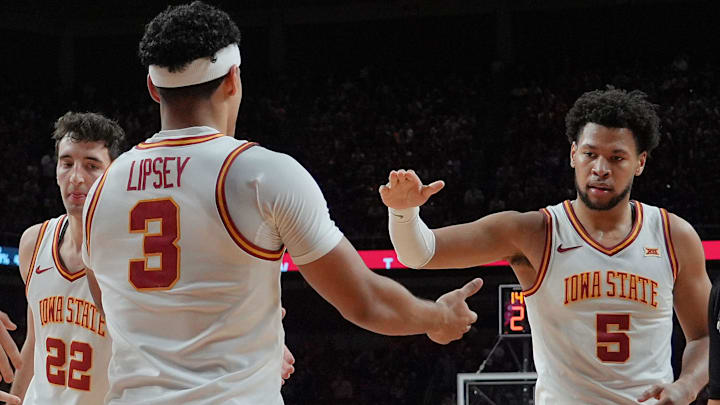 Iowa State Cyclones guard Tamin Lipsey (3)celebrates with Iforward Joshua Jefferson (5) and forward Milan Momcilovic (22) after a three-point play during the second half on Jan. 2, 2026, at Hilton Coliseum in Ames, Iowa. Iowa State Cyclones guard Tamin Lipsey (3)celebrates with Iforward Joshua Jefferson (5) and forward Milan Momcilovic (22) after a three-point play during the second half on Jan. 2, 2026, at Hilton Coliseum in Ames, Iowa.