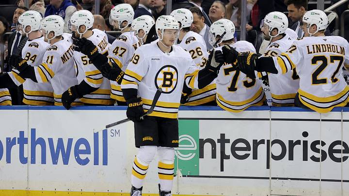 Jan 26, 2026; New York, New York, USA; Boston Bruins center Morgan Geekie (39) celebrates his goal against the New York Rangers with teammates during the second period at Madison Square Garden. Mandatory Credit: Brad Penner-Imagn Images