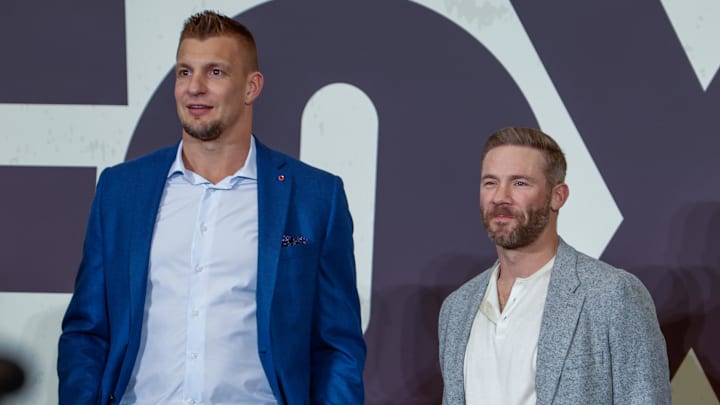 Feb 6, 2025; New Orleans, LA, USA;  Fox NFL analyst Rob Gronkowski and kickoff analyst Julian Edelman during a Fox Sports media party in advance of Super Bowl LIX at Convention Center. Mandatory Credit: Stephen Lew-Imagn Images 