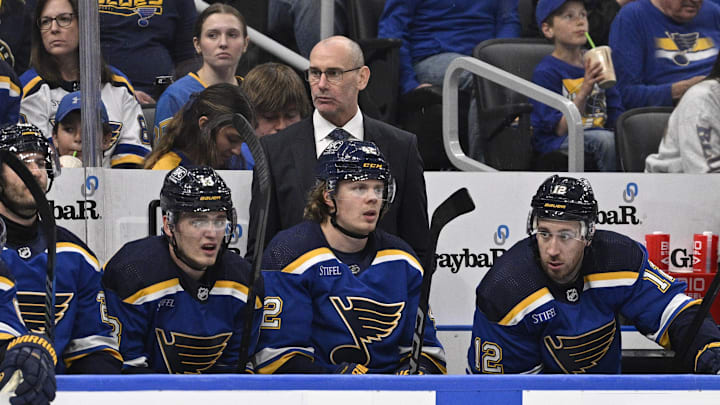 Apr 14, 2024; St. Louis, Missouri, USA; St. Louis Blues Interim Head Coach Drew Bannister looks on during the third period of a hockey game against the Seattle Kraken at Enterprise Center. Mandatory Credit: Jeff Le-Imagn Images Apr 14, 2024; St. Louis, Missouri, USA; St. Louis Blues Interim Head Coach Drew Bannister looks on during the third period of a hockey game against the Seattle Kraken at Enterprise Center. Mandatory Credit: Jeff Le-Imagn Images
