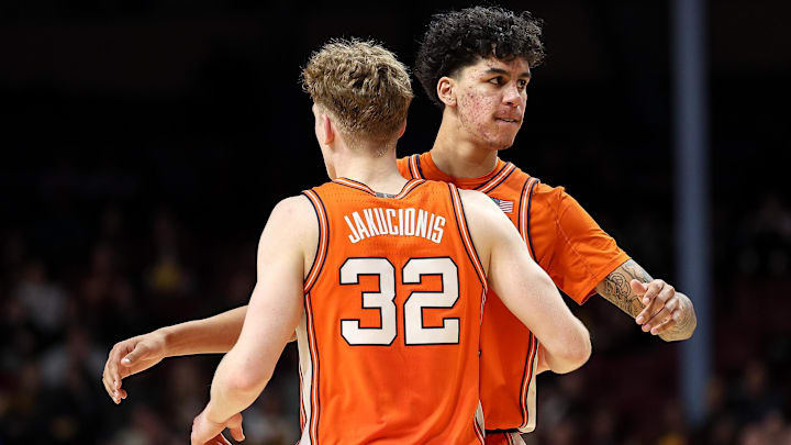 Feb 8, 2025; Minneapolis, Minnesota, USA; Illinois Fighting Illini forward Will Riley (7) and guard Kasparas Jakucionis (32) celebrate during the second half against the Minnesota Golden Gophers at Williams Arena. Mandatory Credit: Matt Krohn-Imagn Images