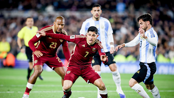 Jefferson Savarino of Venezuela (L) and Nicolas Tagliafico...