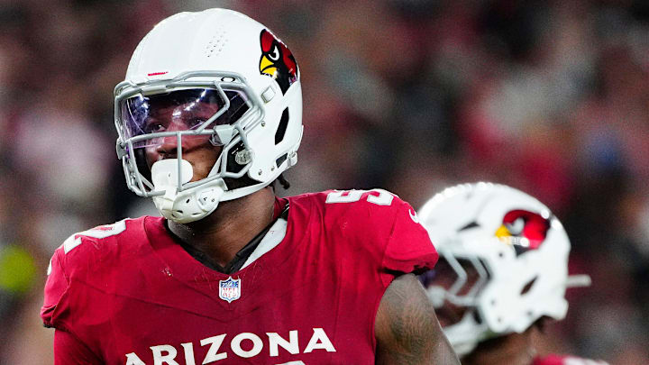 Cardinals edge rusher Jordan Burch (52) lines up against the Raiders during a preseason game at State Farm Stadium in Glendale on Aug. 23, 2025.