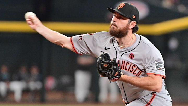 Sep 23, 2024; Phoenix, Arizona, USA; San Francisco Giants pitcher Ryan Walker (74) throws in the ninth inning against the Arizona Diamondbacks at Chase Field. Sep 23, 2024; Phoenix, Arizona, USA; San Francisco Giants pitcher Ryan Walker (74) throws in the ninth inning against the Arizona Diamondbacks at Chase Field.