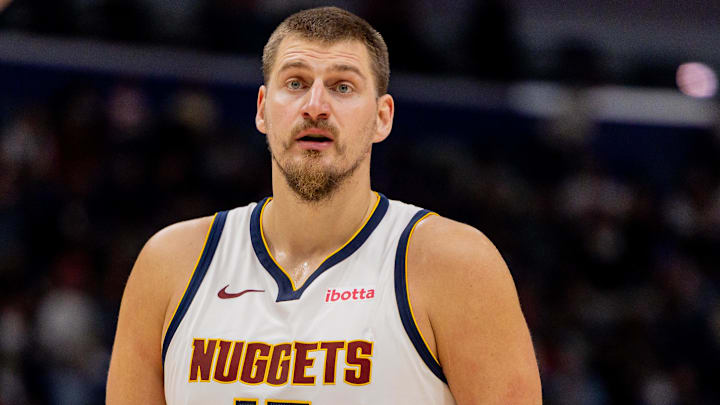 Nov 19, 2025; New Orleans, Louisiana, USA;  Denver Nuggets center Nikola Jokić (15) looks on against the New Orleans Pelicans during the first half  at Smoothie King Center. Mandatory Credit: Stephen Lew-Imagn Images