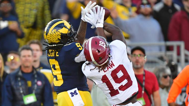 Jan 1, 2024; Pasadena, CA, USA; Alabama Crimson Tide wide receiver Kendrick Law (19) cannot make a catch against Michigan Wolverines defensive back Rod Moore (9) in the second quarter in the 2024 Rose Bowl college football playoff semifinal game at Rose Bowl. Mandatory Credit: Gary A. Vasquez-USA TODAY Sports
