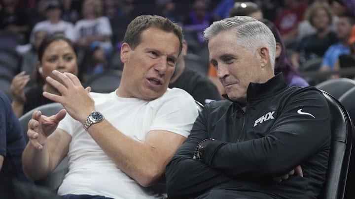 Phoenix Mercury and Suns owner Mat Ishbia (left) talks with new Suns general manager Brian Gregory during the second quarter between the Phoenix Mercury and the Minnesota Lynx at PHX Arena on July 9, 2025.